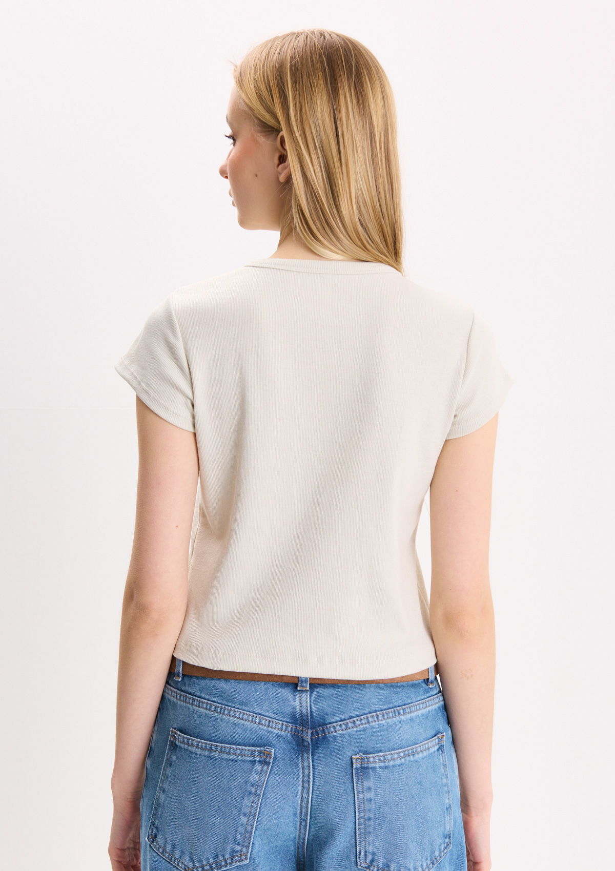 112799501-30999 - REMERA CON CARTERA
